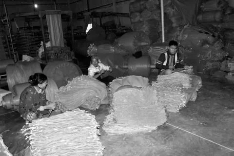 Workers in textile mill Stock Photos