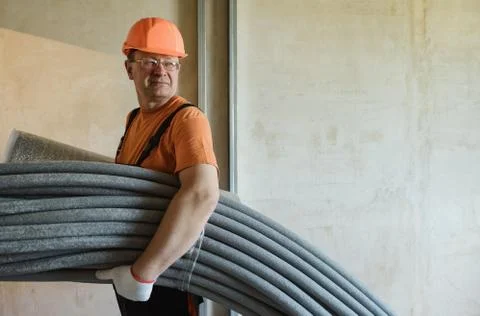 Workers with thermal insulation. Stock Photos