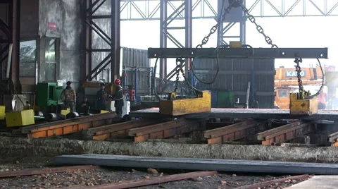 Workers transfer steel blocks Stock-Footage 47892436