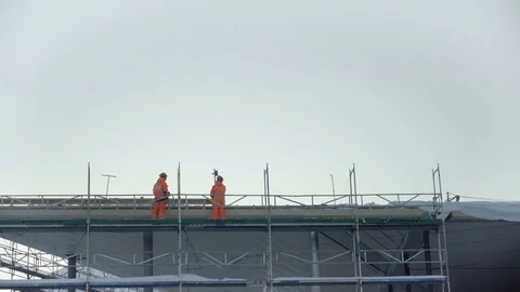 Workers in Tromsø, Norway, construction front Stock Footage 76565760