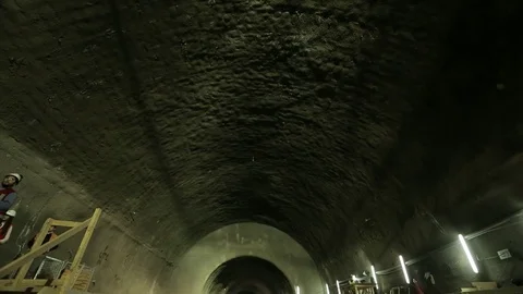 Workers in tunnel Stock Footage 77049333