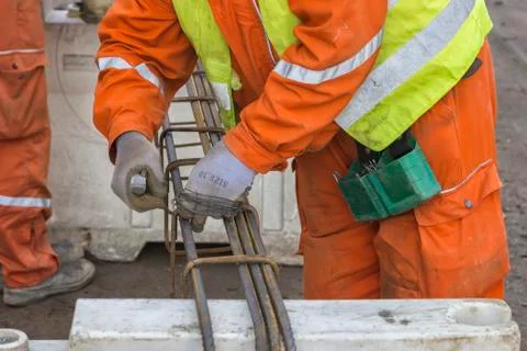 Workers tying rebar Stock Photos