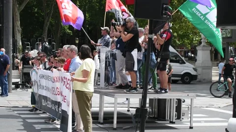 Worker's union strike day one. Bilbao. Singing flags speech Stock Footage 198314277