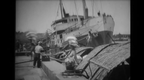 Workers unloading good from ship Stock Footage 37595316