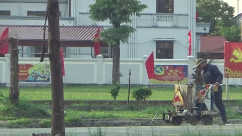 Workers use road marking machines in Vietnam Video stock 315738791