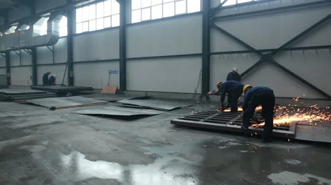 Workers using industrial grinder and metal cutter 스톡 동영상 62442226