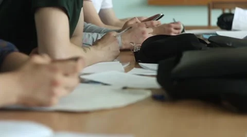 Workers is using mobile phone in the office Stockbeeldmateriaal 51630177