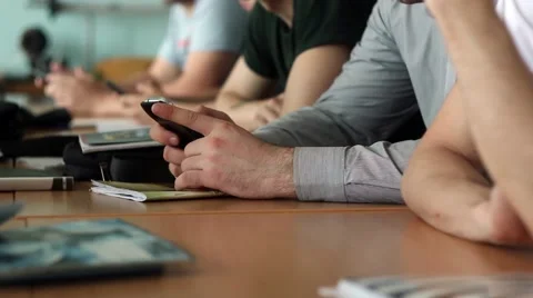 Workers using mobile phone in the office Stockbeeldmateriaal 51630237