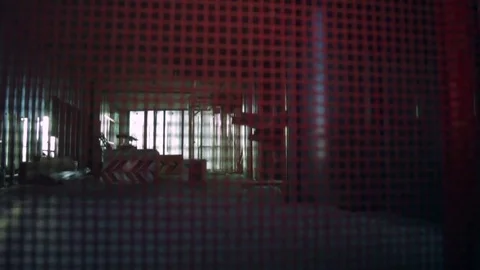 Worker's view from inside of elevator going down in building under construction Stock Footage 77767052