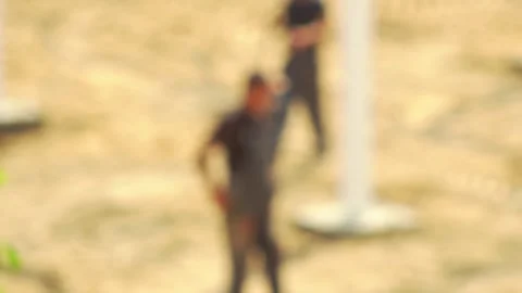 Workers walk around the construction site and work, industry. Blurred, copy Stock Footage 308631483