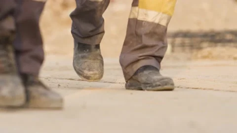 Workers walk on the construction site Stock Footage 160469329