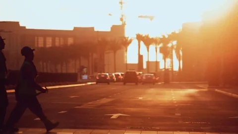 Workers walking across the street in a stright line Stock-Footage 77744980