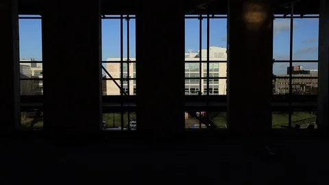 Workers Walking on the Scaffolding From the Inside of the Building Stock Footage 95850246