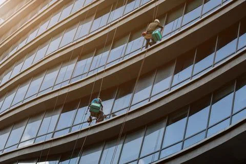 Workers wash the facade Stock Photos
