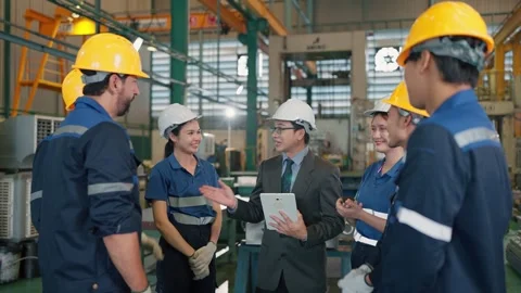 Workers wear hard hats and safety vests Stock Footage 341925164