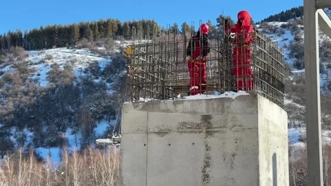 Workers weld the metal structure of the building. Stock Footage 299604390