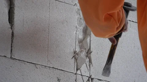 Workers were using a hammer drill to extract a concrete wall  Stock Footage 112948636