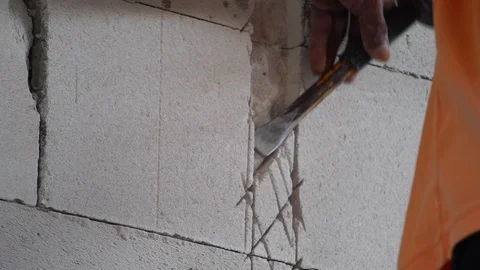 Workers were using a hammer drill to extract a concrete wall  Stock Footage 112948688