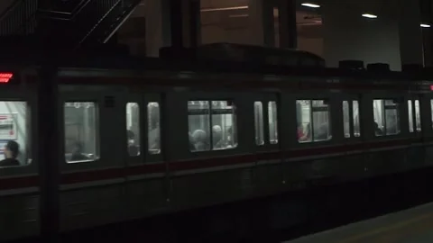 Workers who commute every day by train just got off the train at night Stock-Footage 254068979