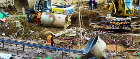 Workers will hurry up and work on the construction site Stock Footage 148560180