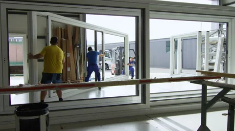Workers in a window factory preparing a shipment to leave. Stock Footage 63010710