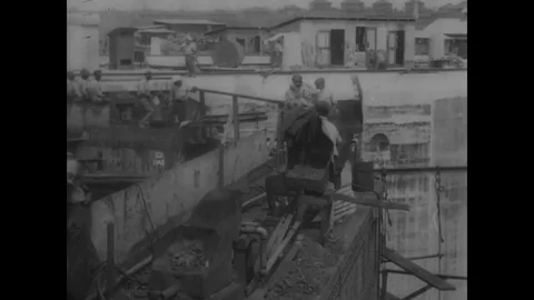 Workers work to build up the Panama Canal - 1913-1914 Stock Footage 83661435