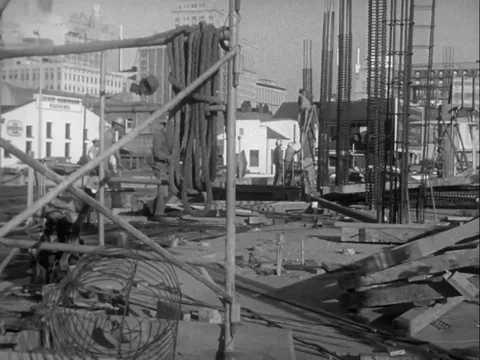 Workers work at a construction area - 1958 Stock Footage 97228789