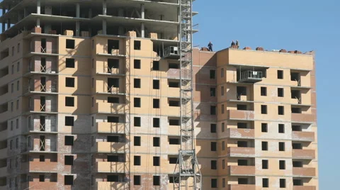 Workers work at a construction site. Crane Stock Footage 62057198