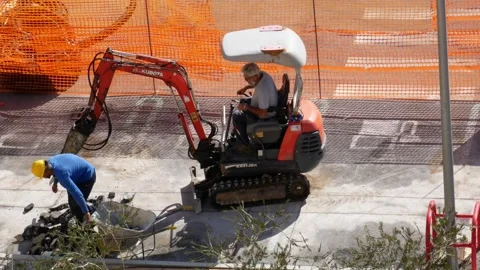 Workers at work on a construction site Stock Footage 253117534