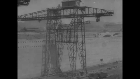 Workers work at a gigantic crane while construction of Panama canal - 1913-1914 Stock Footage 83661479
