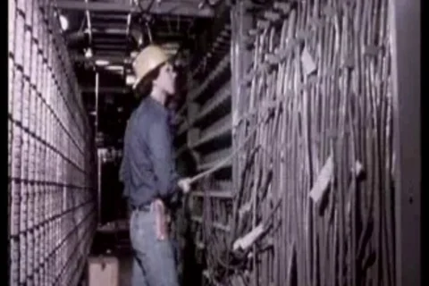 Workers at work make telephone cabling in the Twin Towers. Stock Footage 98822580