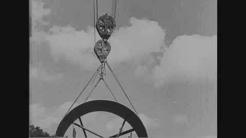 Workers work at Norris dam construction site - 1936 Stock Footage 86486433