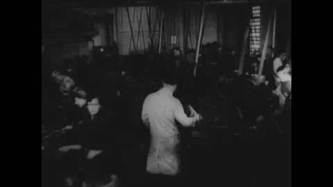 Workers work in ordnance factory - 1940-1943 Stock Footage 83832521