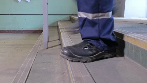 Workers in work shoes Stock Footage 97196068
