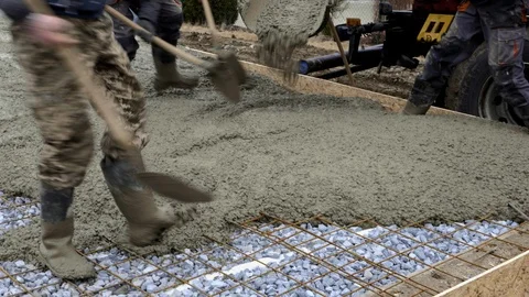 Workers work on site. Detail of casting pump concrete to foundations of house Stock Footage 120564028