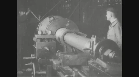 Workers working in ammunition factory Stock Footage