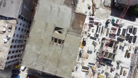 Workers working on construction site, aerial drone video. Stock Footage 248902972