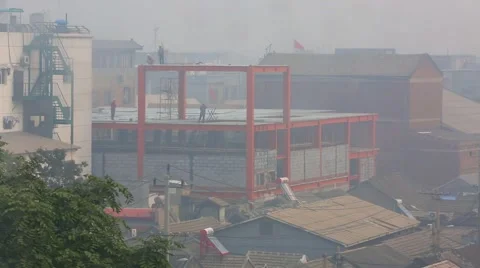 Workers working at construction site. Man welding metal frame for concrete found Stock Footage 55968217