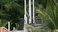 Workers working at hotel building framework construction between palm trees 4k or 4k+ Resolution