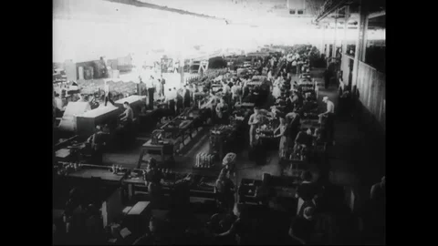 Workers working on manufacturing of antiaircraft guns inside the factory - 1942 Stock Footage 101917670