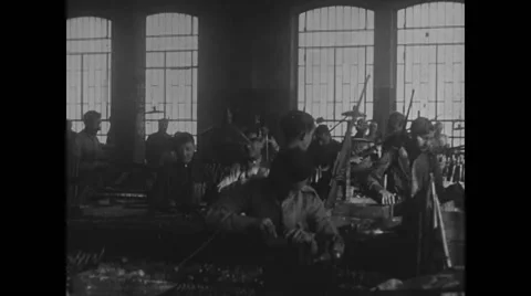 Workers working in rifle factory Stock Footage 43321027