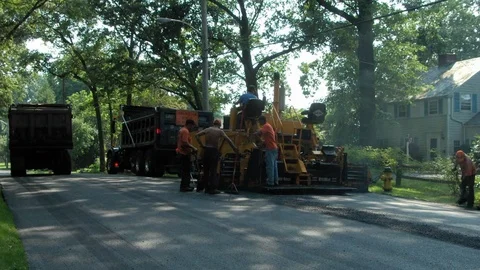 Workers working at road construction site Video stock 81230635
