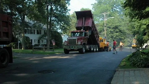 Workers working at road construction site Stock Footage 81231498