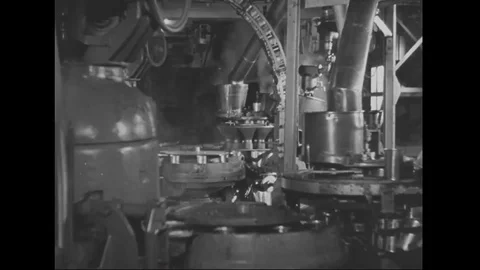 Workers working in a tin can production factory - 1940 Stock Footage 101986395