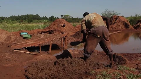 Workers working in the Uganda gold mine Stock Footage 148747035