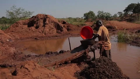 Workers working in the Uganda gold mine Stock Footage 148747047