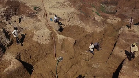Workers working in the Uganda gold mine Stock Footage 148747049