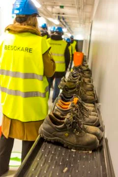 Workers in yellow flags in Sweden Stock Photos