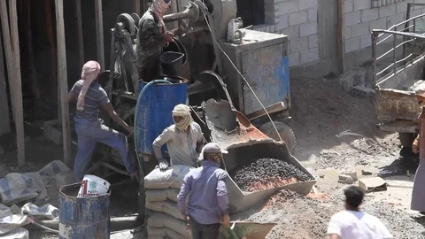 Workers in Yemen while building in remote areas in IBB Stock Footage 108820712