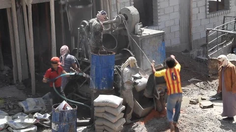 Workers in Yemen while building in remote areas Stock Footage 108820714